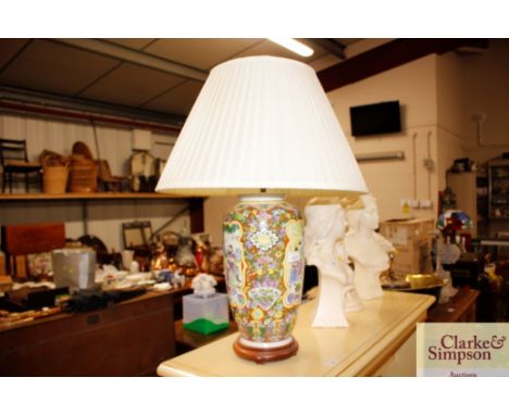 An oriental baluster table lamp and shade