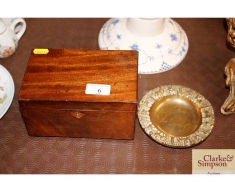 A Victorian mahogany two compartment tea caddy; and a heavy brass dish with figure decoration 