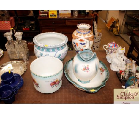 An Oriental jardiniere; a Japanese style baluster vase; a toilet jug and basin etc. 