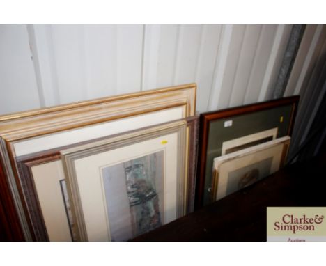 A large collection of various decorative prints etc.; and a polished framed mirror 