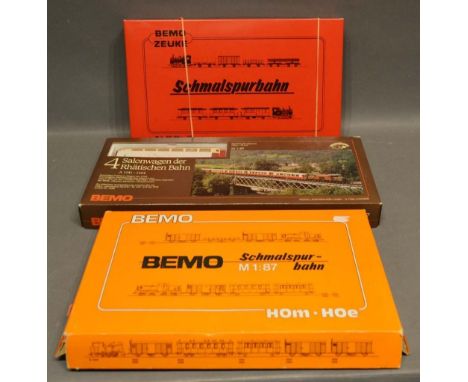 A Bemo HO M Scale Train Set, together with another similar, together with a Bemo four salon wagon set, all within original bo