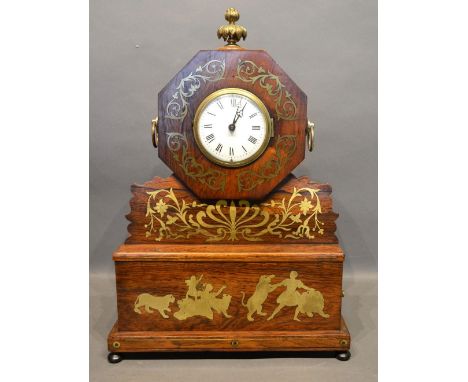 A Regency Rosewood and Brass Inlaid Mantel Clock, the enamel dial with Roman numerals within a hexagonal case with brass fini