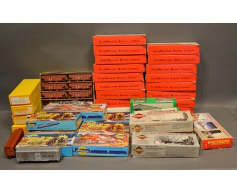 A Collection of HO Scale Plastic Model Kits by the Intermountain Railway Company within boxes, together with a small collecti