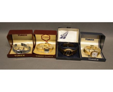 A Timex Stainless Steel Cased Ladies Wristwatch, together with two other by Timex and another by Avia 
