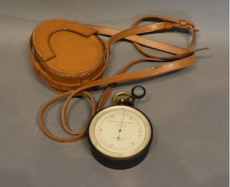 A Black Japanned and Brass Compensated Barometer inscribed Improved Surveying Aneroid Compensated by Negretti and Zambra, Lon