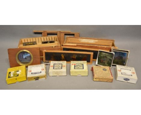 A Collection of Automaton Magic Lantern Slides with Viewer and various boxed sets of magic lantern slides to include Peter Pa