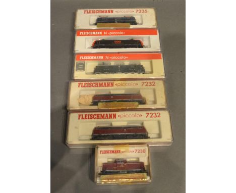 A Fleischmann Piccolo Locomotive 7232, together with six other similar Fleischmann Piccolo N scale locomotives within boxes