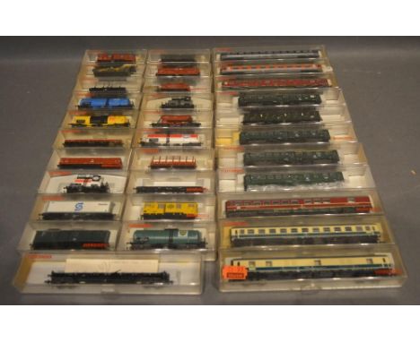 A Collection of Fleischmann Piccolo N Scale Rolling Stock within boxes, together with a small collection of similar coaches, 