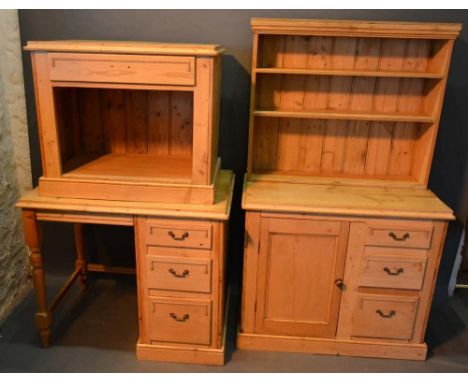 A Pine Small Dresser with a boarded shelf back above three drawers and a cupboard door, together with a similar pine desk and