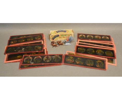A Ben Bros Diecast of Father Christmas and Sleigh with original box, together with a collection of magic lantern slides 