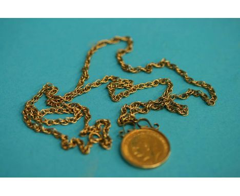 A half sovereign dated 1912 , in a 9ct gold mount and chain. Total weight 11.8grams 