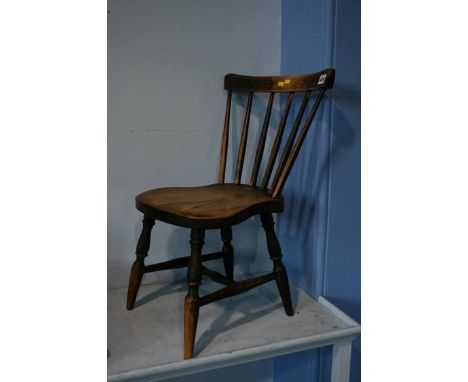 A Child's stick back chair