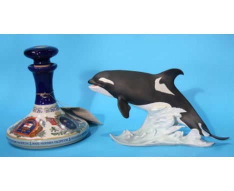 A Kaiser porcelain figure of a killer whale, limited edition 616/4000 and a Wade 'Pussers Rum' decanter 