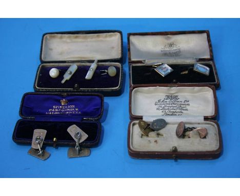 A pair of Guinness cuff links, mother of pearl cricket bats and boxing gloves and a pair of cufflinks engraved with dogs