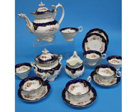 A Coalport tea service comprising teapot, sucrier, cream jug and seven cups and six saucers (15)