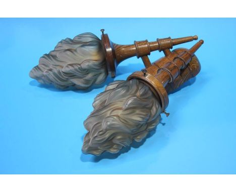A 1930's oak two sconce wall light with flame shades