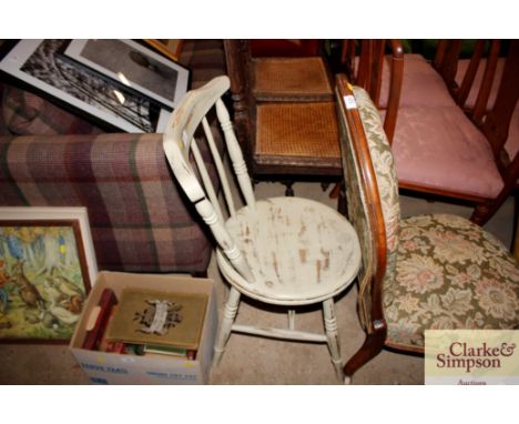 A painted stick back kitchen chair