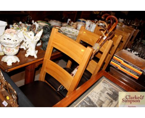 A set of six elm ladder back dining chairs 