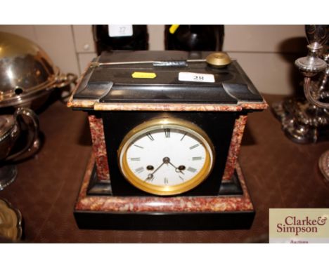 A Victorian marble mantel clock 