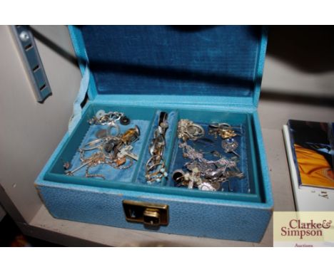 A blue trinket box and contents of various jewellery