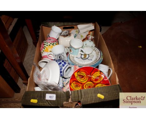 A box of china including Poole pottery