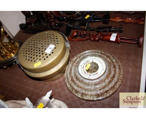 A circular onyx barometer; and a brass incense burner with swing handle 