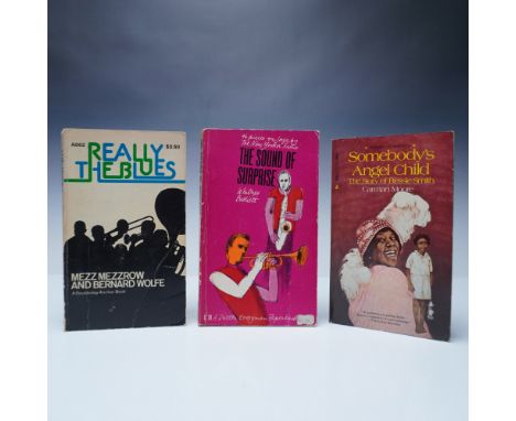 A collection of three jazz-themed paperback books: Really The Blues by Mezz Mezzrow and Bernard Wolfe (Anchor Books, 1972), T
