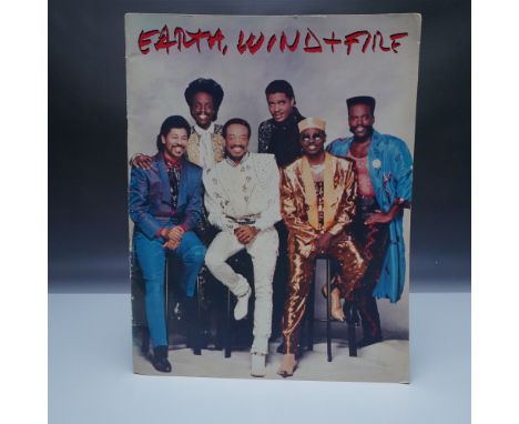 Original Earth, Wind &amp; Fire Touch The World Tour program from 1988, featuring a vibrant cover design and full-color image