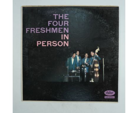 This vintage LP features The Four Freshmen performing live, titled In Person, released by Capitol Records (T-1008). The recor