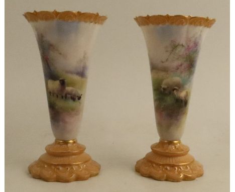 A pair Royal Worcester vases, decorated with sheep in a spring meadow with blossom tree by Harry Davis, with blush ivory rims