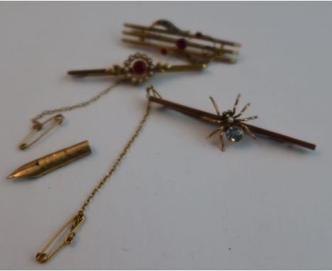 A 9ct spider brooch, set aquamarine and pearl, together with a 9ct pearl and ruby brooch (possibly synthetic) and a gold broo