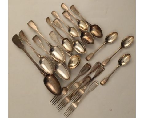A collection of silver fiddle and thread pattern flatware, to include a basting spoon, serving spoons, forks, other spoons, o