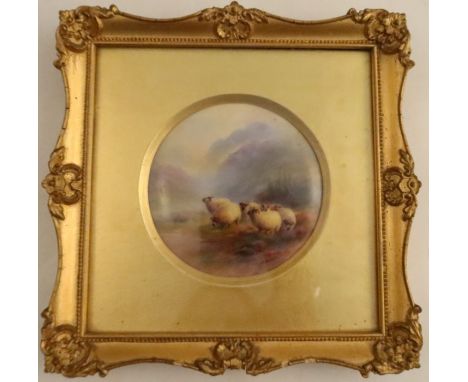 A framed Royal Worcester circular plaque, painted with six sheep in a Highland setting by Harry Davis, diameter 4ins -&nbsp;T