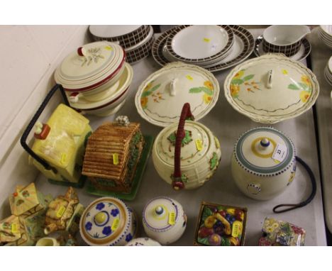 Four various biscuit barrels to include a Poole pottery example 