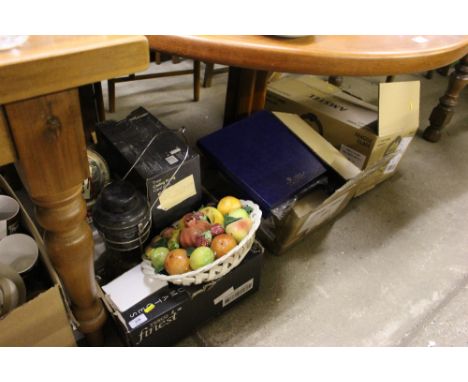 Three boxes containing a tilley lamp, a china fruit basket, a Coalport plate, pint glasses, light fittings etc. 
