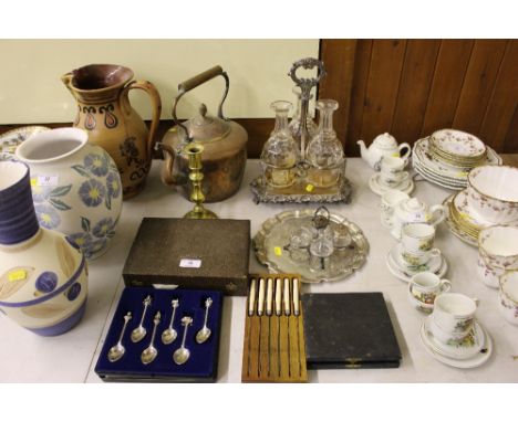 A silver plated three bottle decanter stand; together with a Victorian copper kettle; a set of commemorative tea spoons; vari