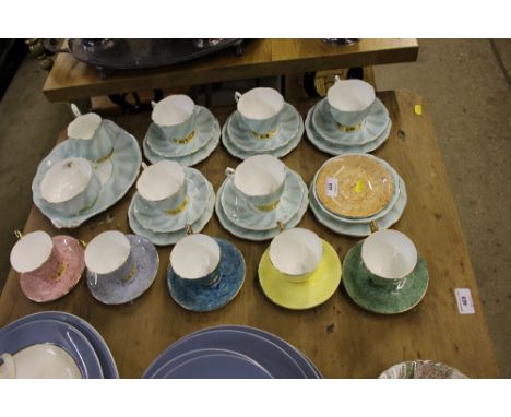 Five Royal Albert "Gossamer"tea cups and saucers; together with Royal Albert "Rosamund" china trios etc. 