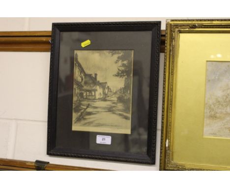 A pencil signed etching depicting a street in Lavenham