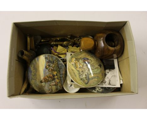 A box containing Pratt ware pot lids, costume jewellery; wooden nut cracker post-cards etc.