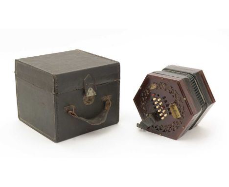 A Lachenal 48 button English system concertina, with rosewood fret-cut ends, the bone buttons stained red and black, engraved