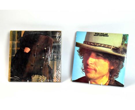 2 Bob Dylan compilation albums: Masterpieces (CBS S3BP 220502); and Blonde on Blonde (CBS 66012). (2)