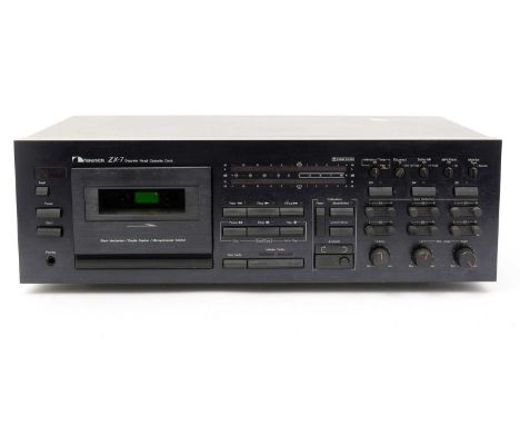 A Nakamichi ZX-7 discrete-head cassette deck, with instruction manual.