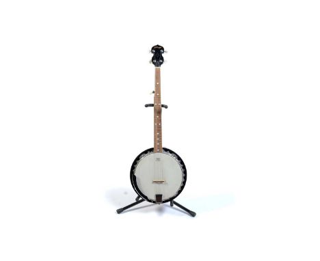 A Stagg five string G banjo with aluminium tone-ring and mahogany resonator, Ritter soft case.