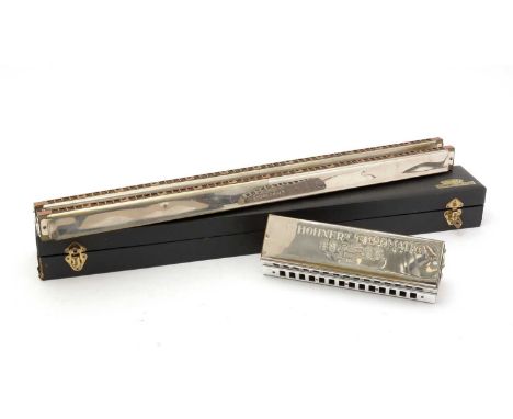 A Hohner Accorda 267/384 chord harmonica, in original box; together with a Hohner Chromatica 265/58 double bass harmonica.