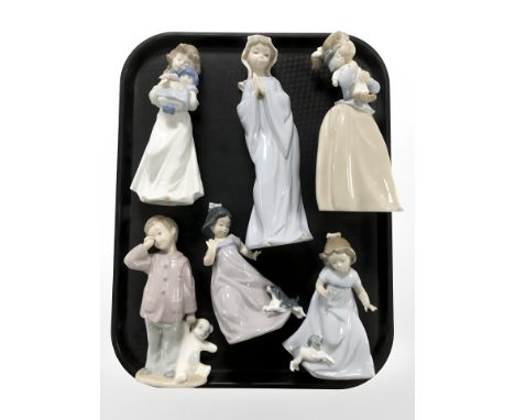Six various Nao figures, tallest 26 cm.