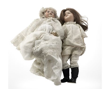 A Kammer & Reinhardt bisque-headed jointed doll, plus another similar doll