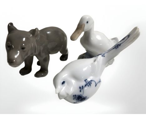 A Royal Copenhagen bear cub, a duck and a further figure of a bird, longest 15 cm.