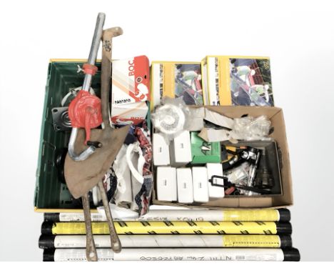 Assorted tools and hardware including tubes of welding rods, pipe bender, bolt cutters, trolley wheels, safety hand books, et