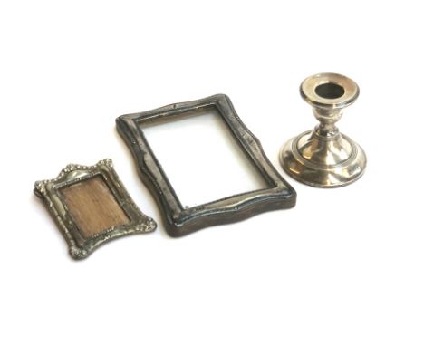 A small silver picture frame by Charles Boyton &amp; Son Ltd, Birmingham 1917, internal dimensions 12x7cm; and one other very