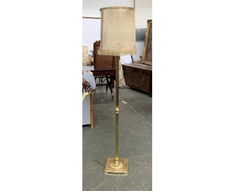 A gilt metal reeded standard lamp, with shade, on a square base, approx. 163cmH to top of shade 